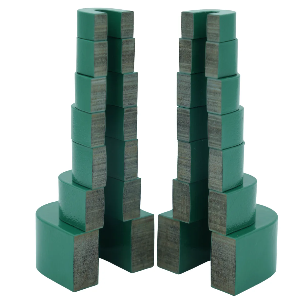 Nanocrystalline C-core halves stacked by size, showing precision-cut faces and ribbon laminations