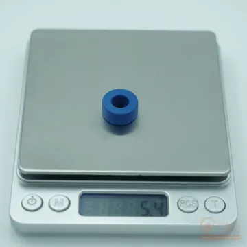 Digital scale mass measurement showing sample weight for CenturaCores nanocrystalline toroid CCNT-016-010-006-MFBL.