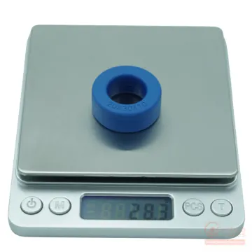 Digital scale mass measurement showing sample weight for CenturaCores nanocrystalline toroid CCNT-030-020-010-MFBL.