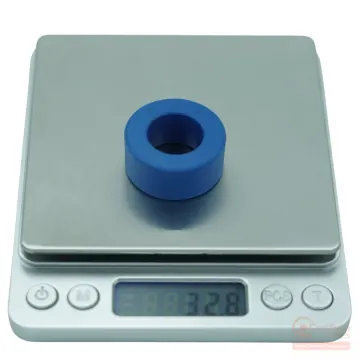 Digital scale mass measurement showing sample weight for CenturaCores nanocrystalline toroid CCNT-030-020-012-MFBL.