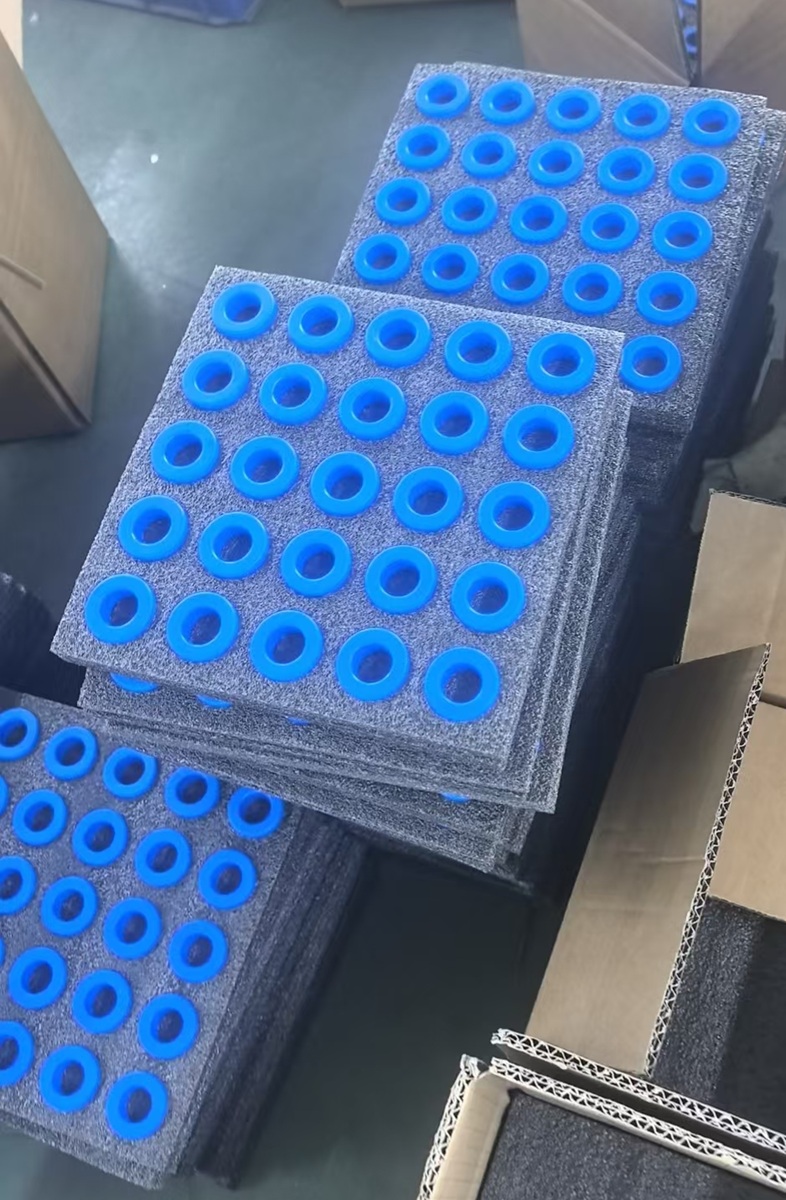Stacked high-density custom-molded foam trays with each nanocrystalline core isolated in its own pocket